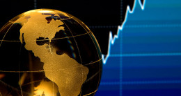 Enflasyon küresel ekonomik büyümeyi aşağı çekiyor: Reuters anketi